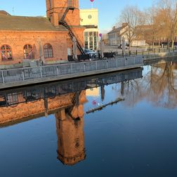 the Falun River with the old old firehouse